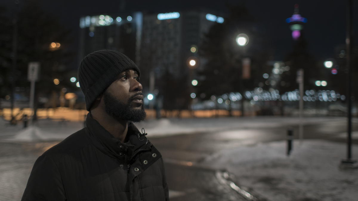 Godfred - Godfred Addai-Nyamekye in Calgary's East Village, where he was tasered and beaten by a police officer in 2013 Godfred - Godfred Addai-Nyamekye in Calgary's East Village, where he was tasered and beaten by a police officer in 2013